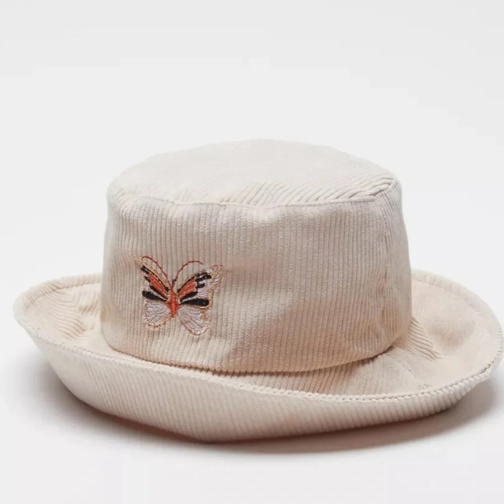 Urban Outfitters Monarch Butterfly Corduroy Bucket Hat Cream
